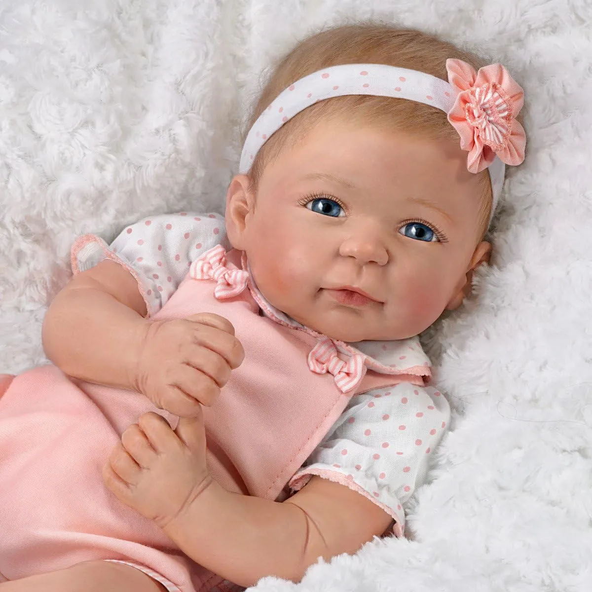 The Ashton - Drake Galleries Ava Lifelike TrueTouch® Authentic Silicone Baby Girl Doll with Hand Rooted Hair and Pink Jumper Weighted for Realism Fully Poseable by Master Doll Artist Linda Murray 18"-Inches