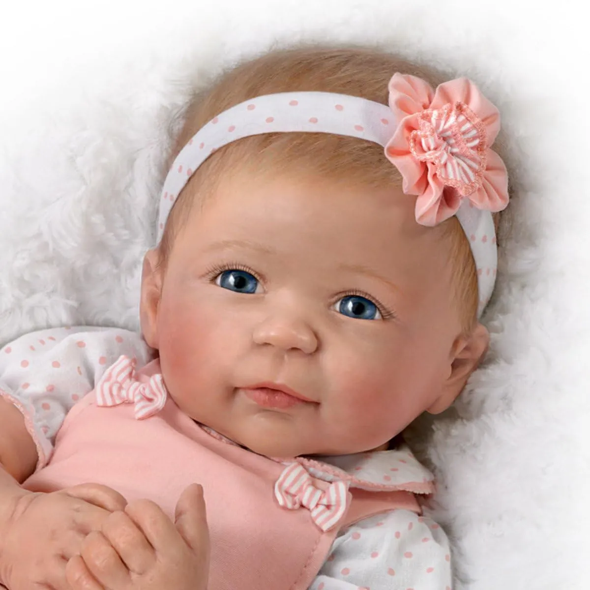 The Ashton - Drake Galleries Ava Lifelike TrueTouch® Authentic Silicone Baby Girl Doll with Hand Rooted Hair and Pink Jumper Weighted for Realism Fully Poseable by Master Doll Artist Linda Murray 18"-Inches