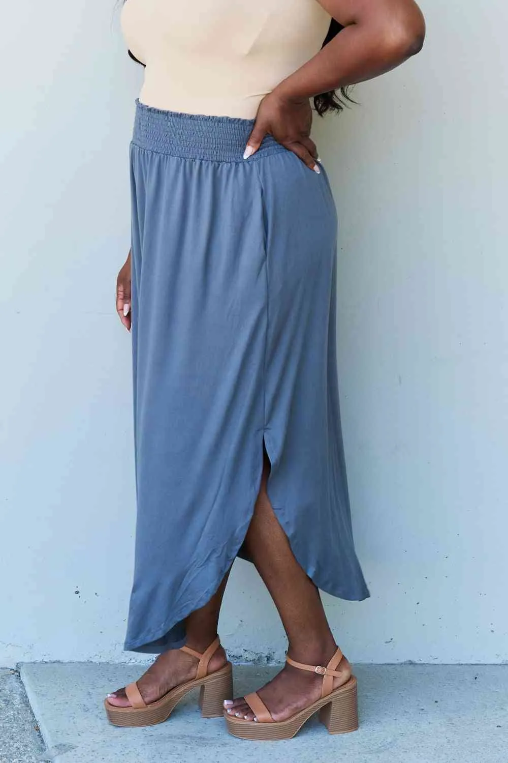 The Nina High Waist Scoop Hem Maxi Skirt in Dusty Blue