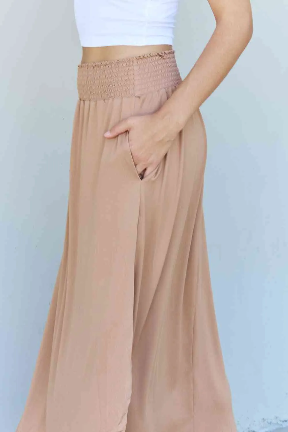 The Nina High Waist Scoop Hem Maxi Skirt in Tan