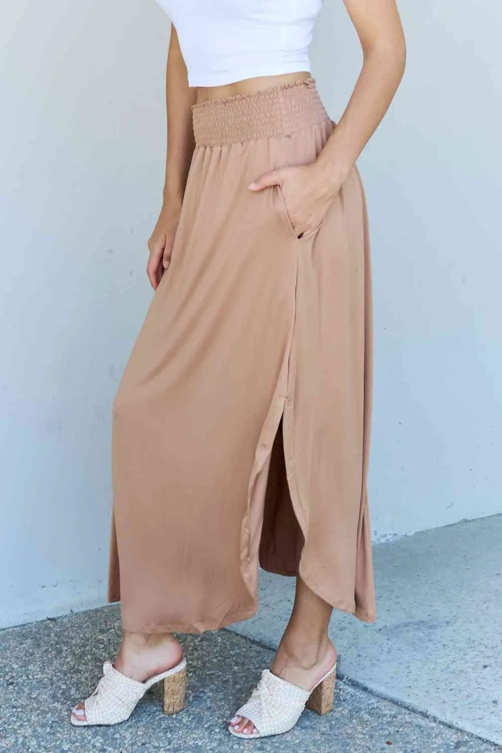 The Nina High Waist Scoop Hem Maxi Skirt in Tan