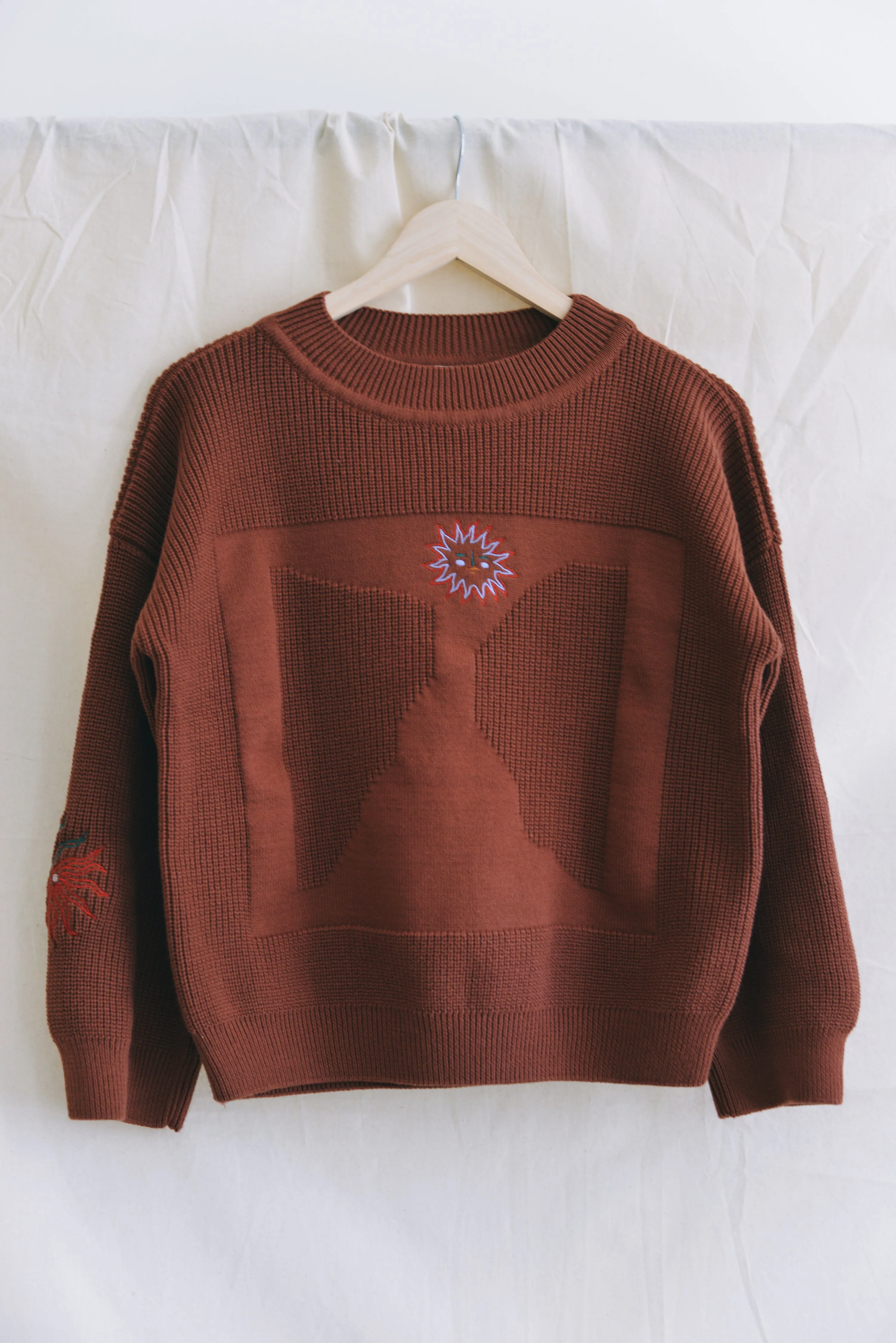 x Madeleine Kemsley collab MOA jumper rust